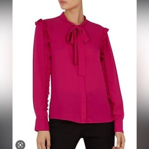 Ted Baker blouse that is hardly worn. Selling because it is too small for me now